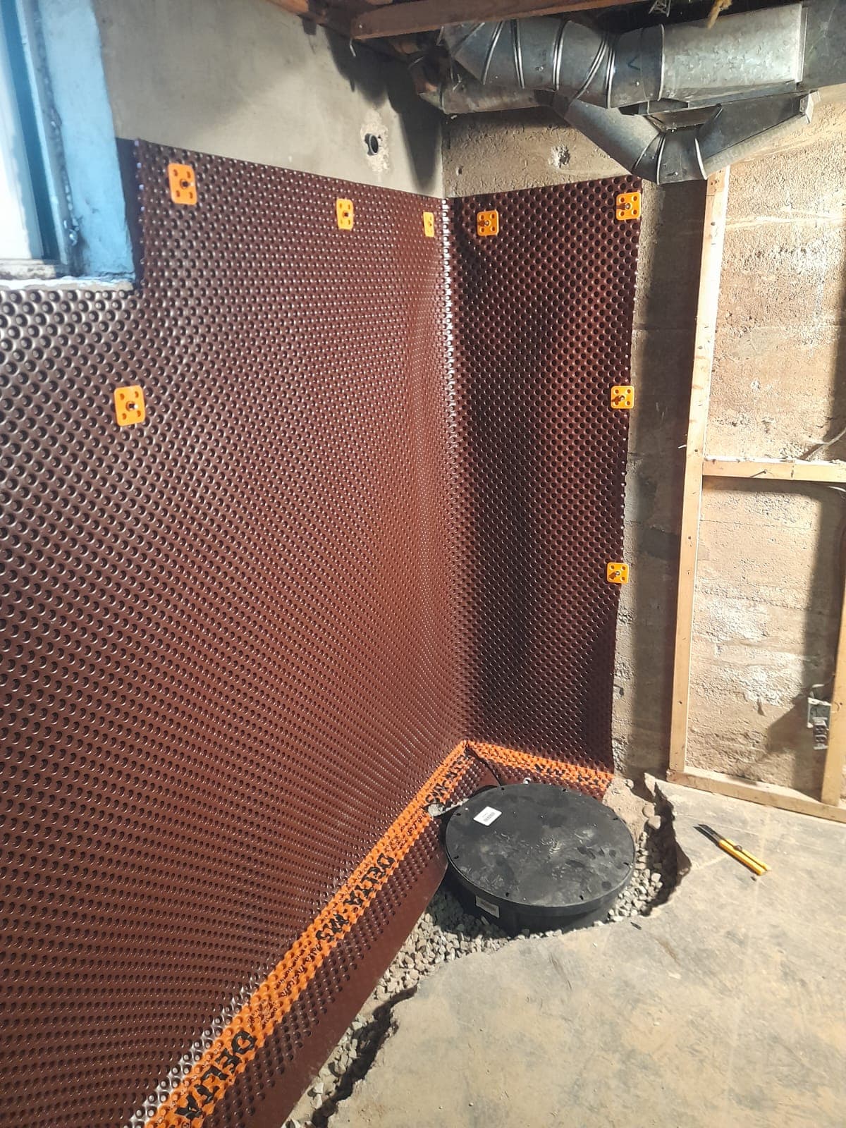 Interior dimpled membrane installation by Waterproof Barrie