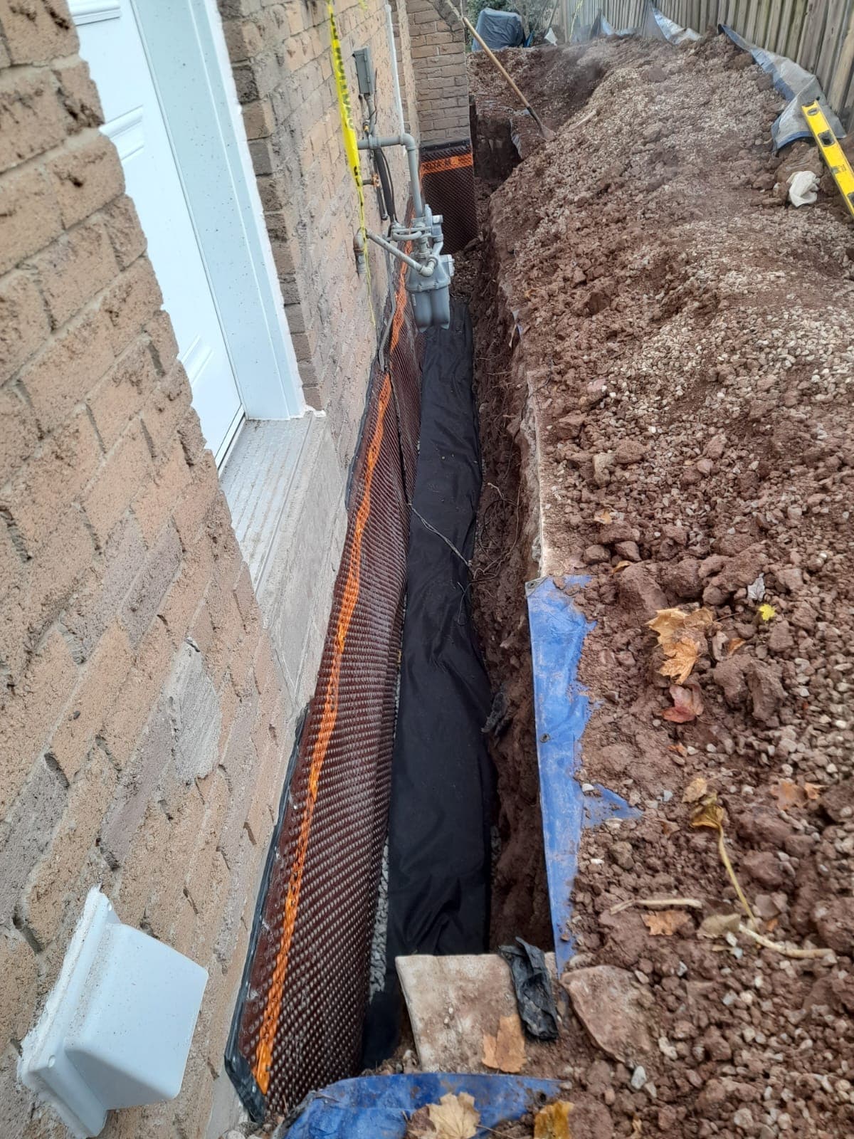 Exterior basement waterproofing excavation in Barrie